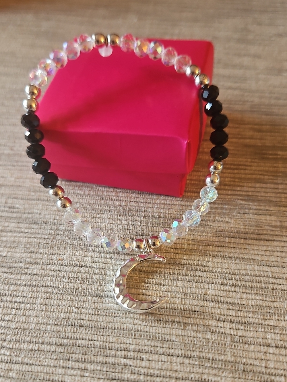 Avon Moonlight Glow Crystal and Black Beaded Crescent Moon Bracelet.